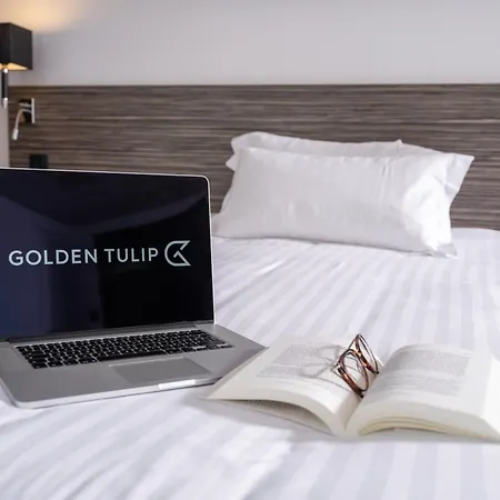 Golden Tulip And Отель
