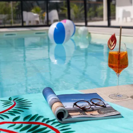 Golden Tulip And Отель